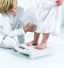 The seca 354 is a versatile baby scale with a 10 g graduation, converting into a children's floor scale with a 20 kg capacity. It features a secure locking tray, detech function, and user-friendly design for accurate and easy weighing.